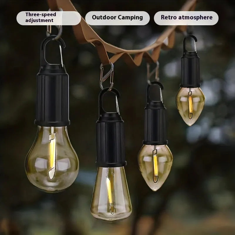 Five solar-powered garden lanterns with warm white LED light and pastoral style design