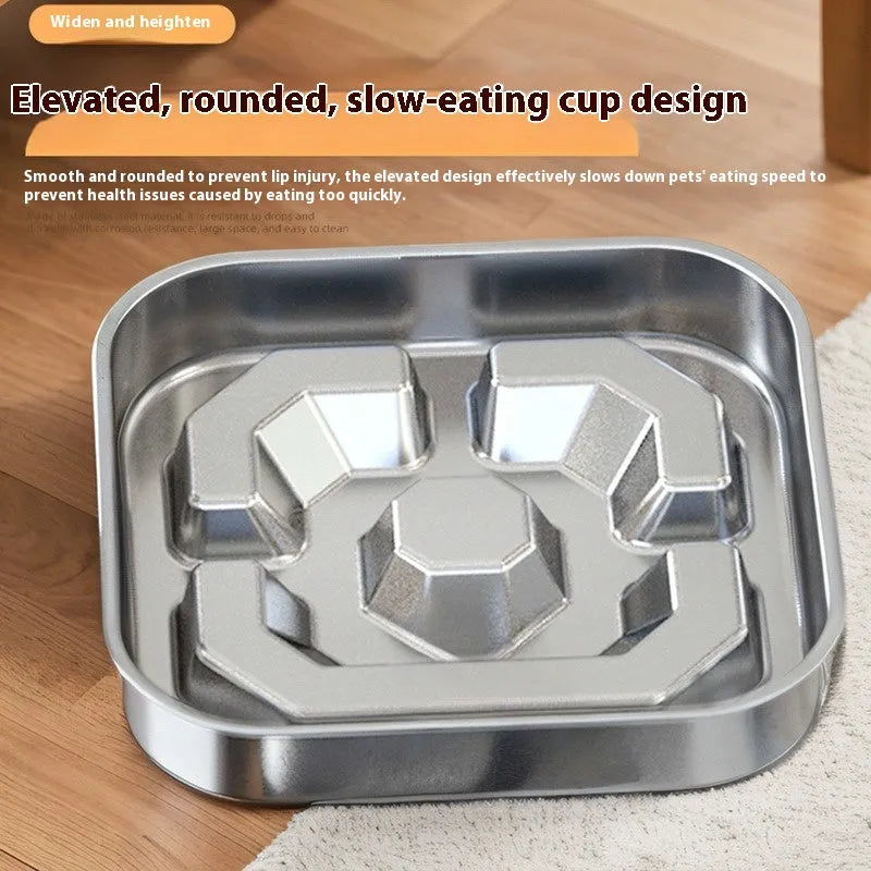 Stainless steel slow feeding dog bowl with raised bone square pattern on a non-slip square base