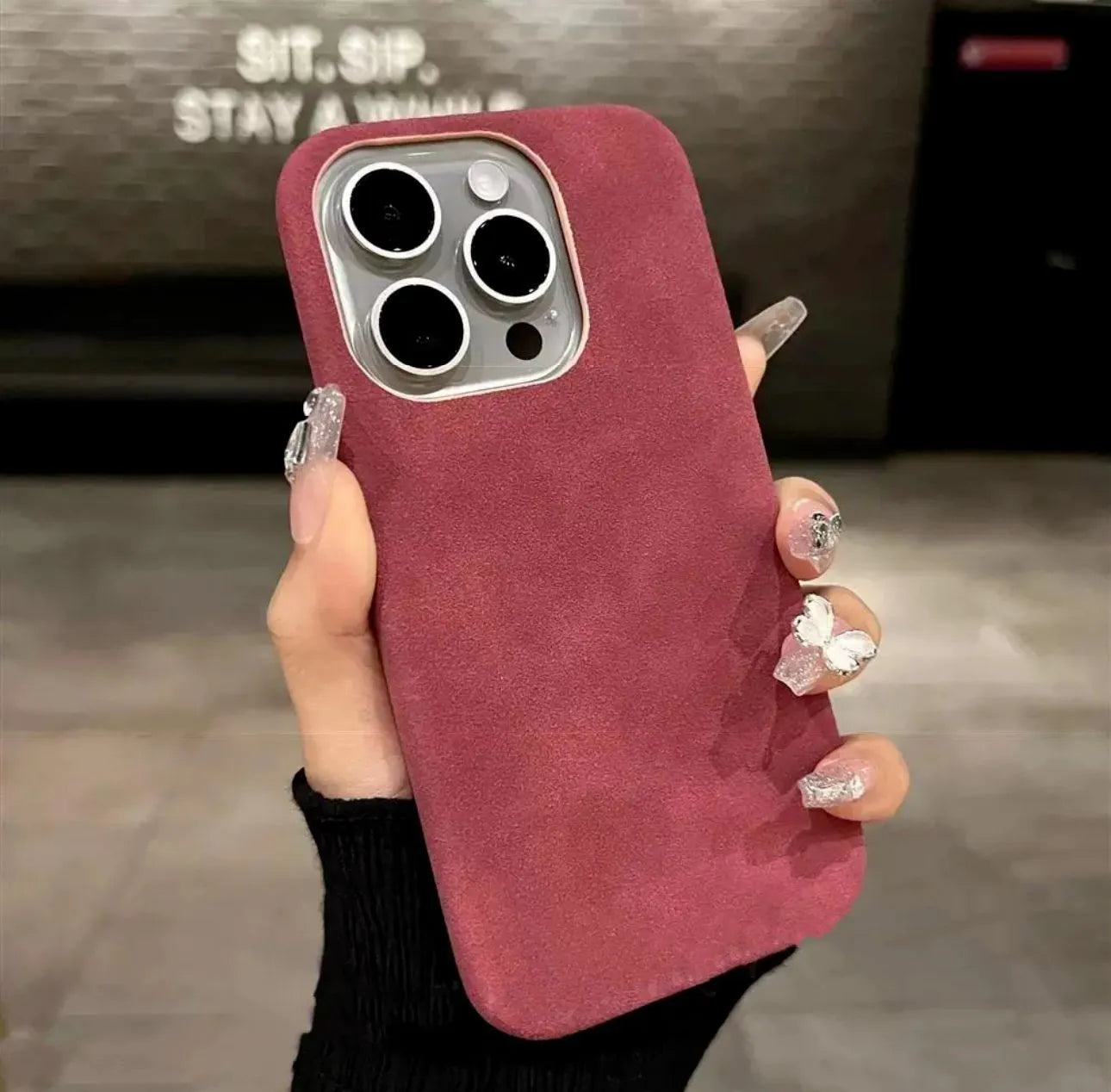 Solid colour suede imitation leather iPhone case in half-pack design showing shockproof protection features