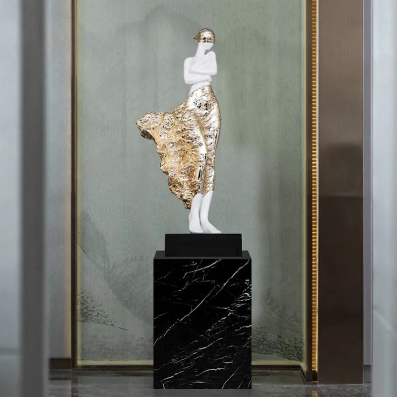 Modern sculptured resin ornament in rose gold or silver, 48cm high.