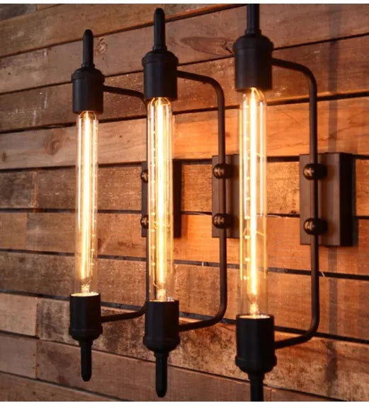 American style black iron wall lamp with E27 holder on a staircase