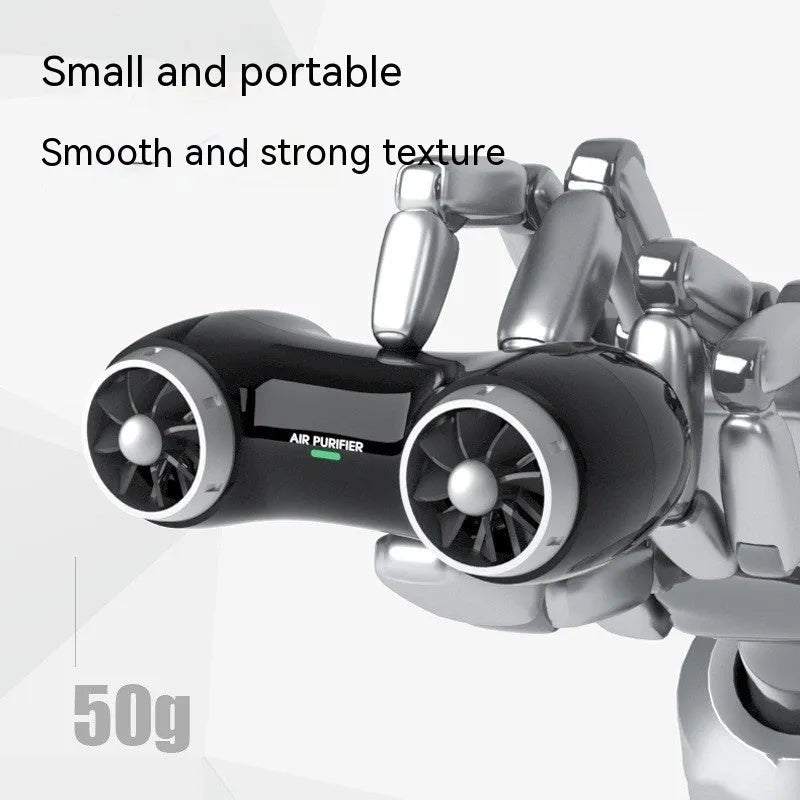 Compact black car air purifier with anion generator and aromatherapy functions