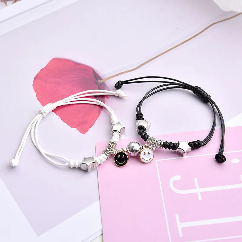 Magnet couple bracelets with electroplated finish showing magnetic clasp and symbolic design options