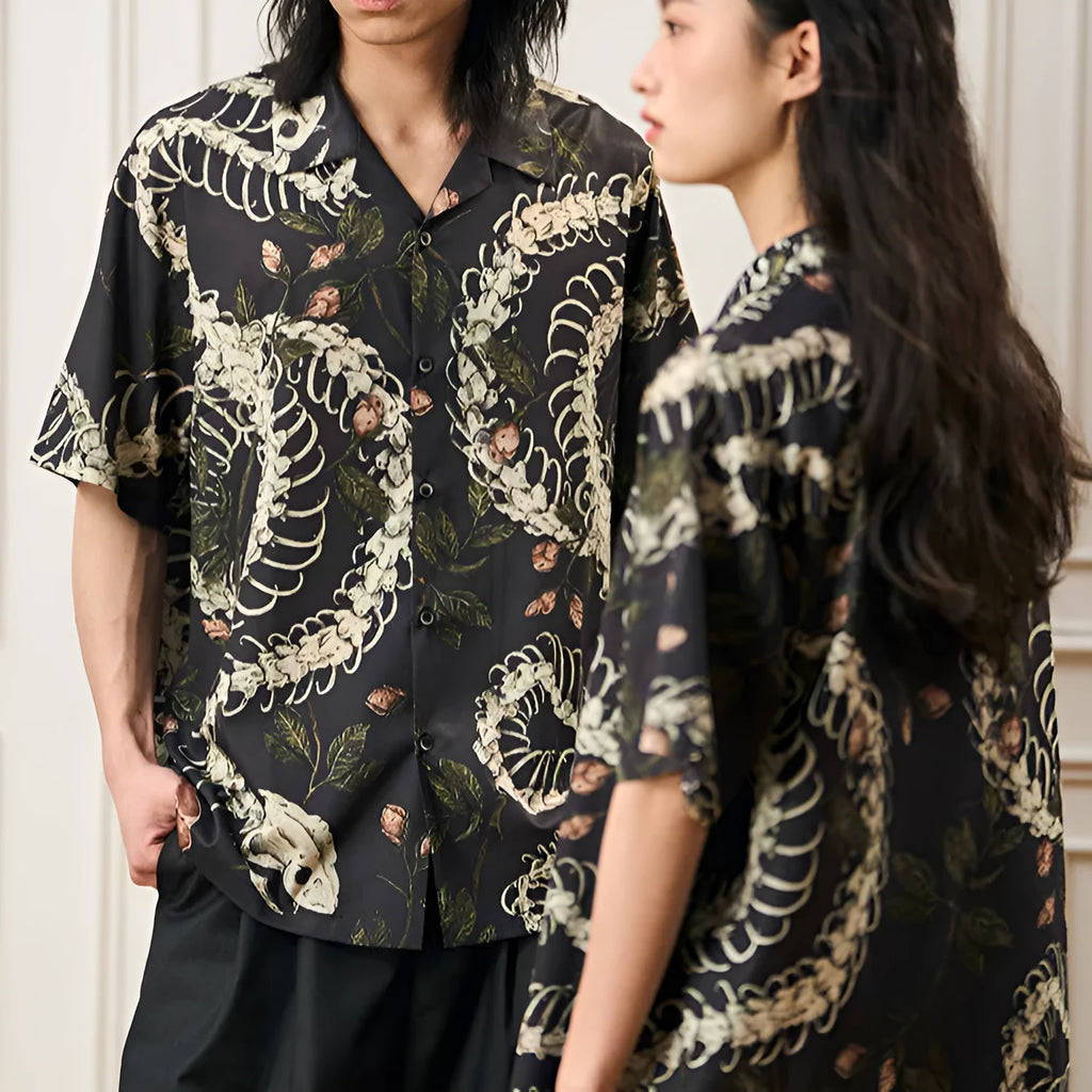 Short sleeve Cuban collar shirt with a printed snake bone and floral pattern in a loose fit.