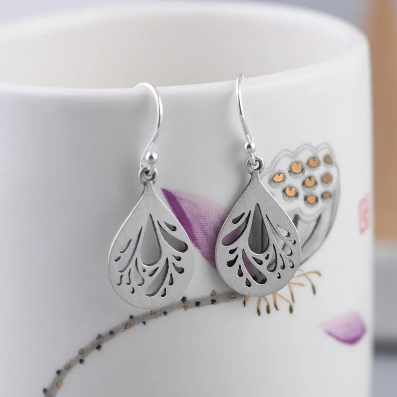 925 silver hollow water drop earrings with retro craft style and grinding finish