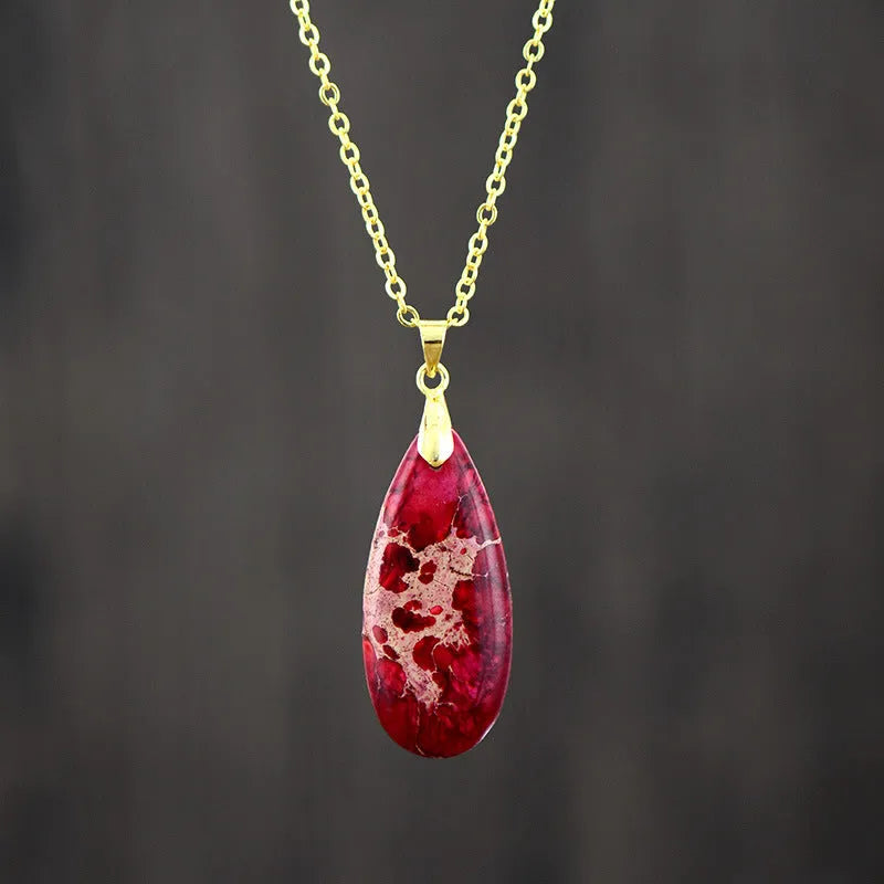Jade water drop pendant on an 18K gold-plated chain, showing colour finish options.