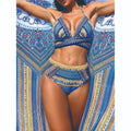 Women's blue cross bandage bikini top with high-waist split-side briefs from three-piece swimsuit set