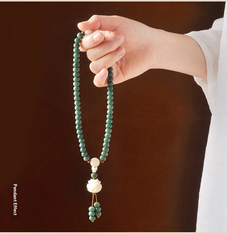 White jade and green sandalwood bodhi seed bracelet with double circle safety buckle and lotus design