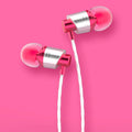Black wired in-ear headphones with 3.5mm plug, in-line microphone, and silicone ear tips on a white background.