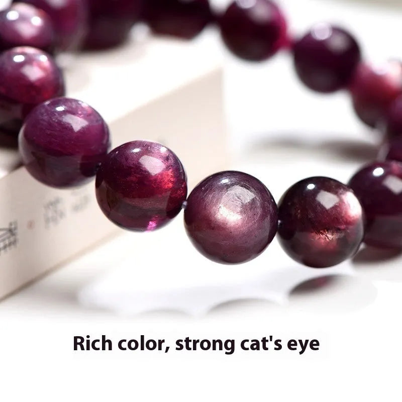 Purple lepidolite crystal round bead bracelet showing polished geometry beads in natural mineral colour