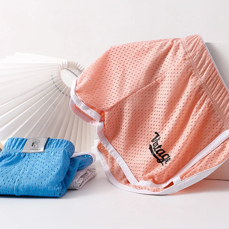 Ice silk men's quick-drying breathable mid waist underwear in multiple colours on a size chart.