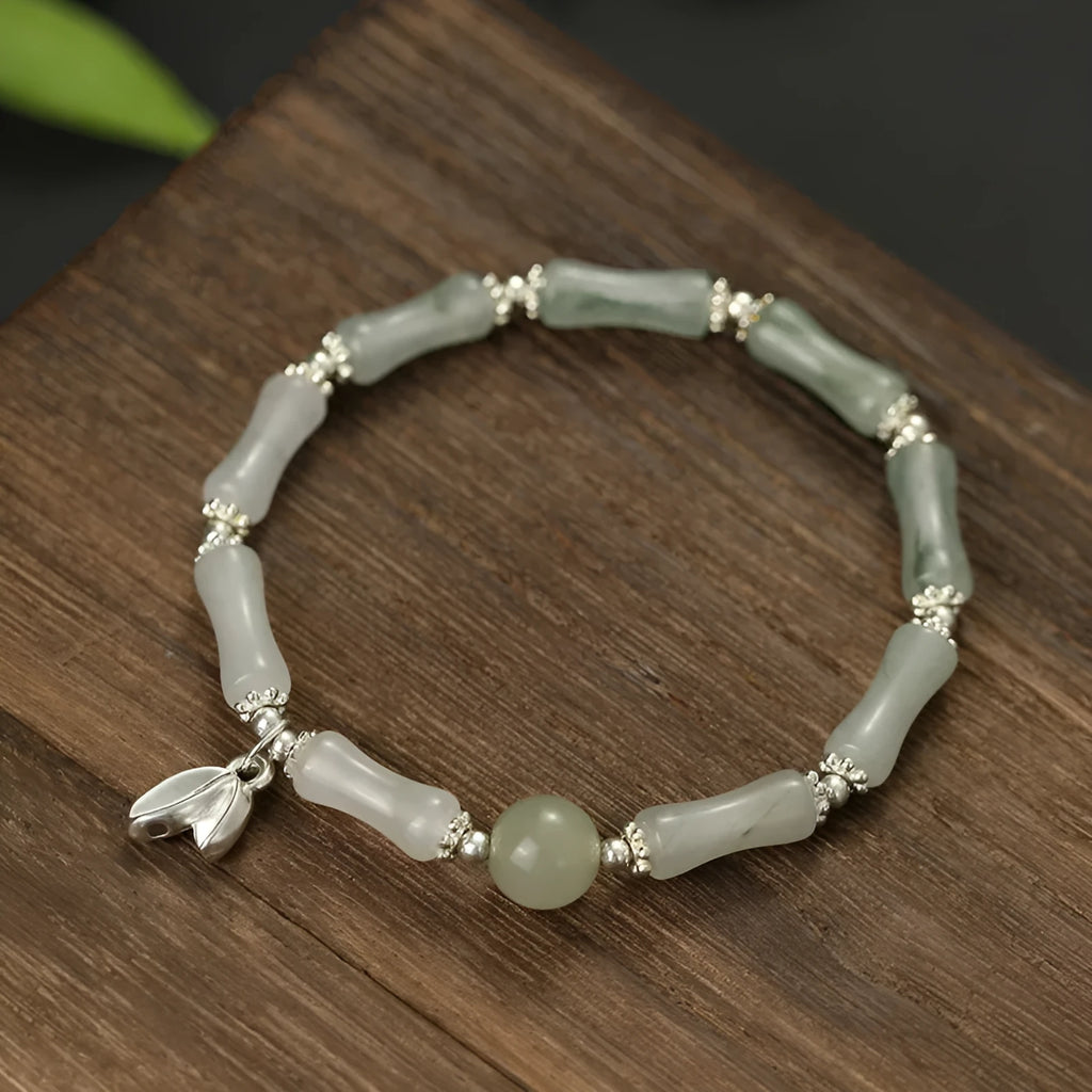 Natural Tianshan green bamboo and sterling silver antique-style bracelet for women with a bamboo joint motif.