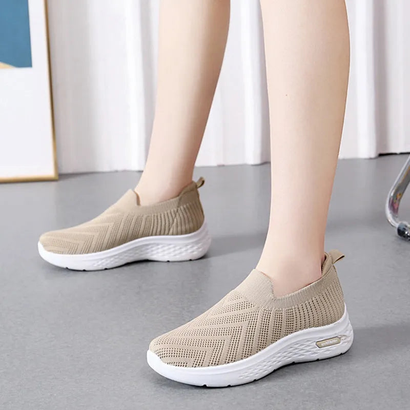 Women's casual mesh slip-on shoes, breathable sock style, soft plastic sole, available in black grey khaki pink