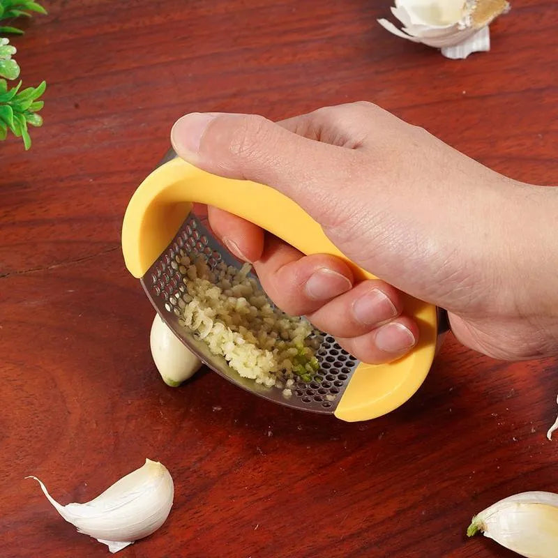 Stainless steel garlic masher press with ergonomic handle and non-slip grip