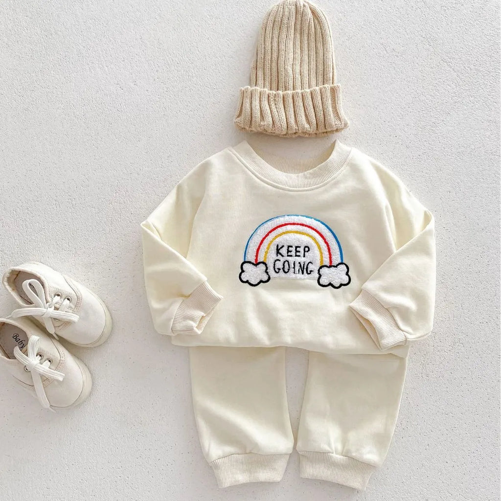 Children's rainbow sweater two-piece set in beige with cartoon and flower patterns, cotton pullover top and trousers for toddlers