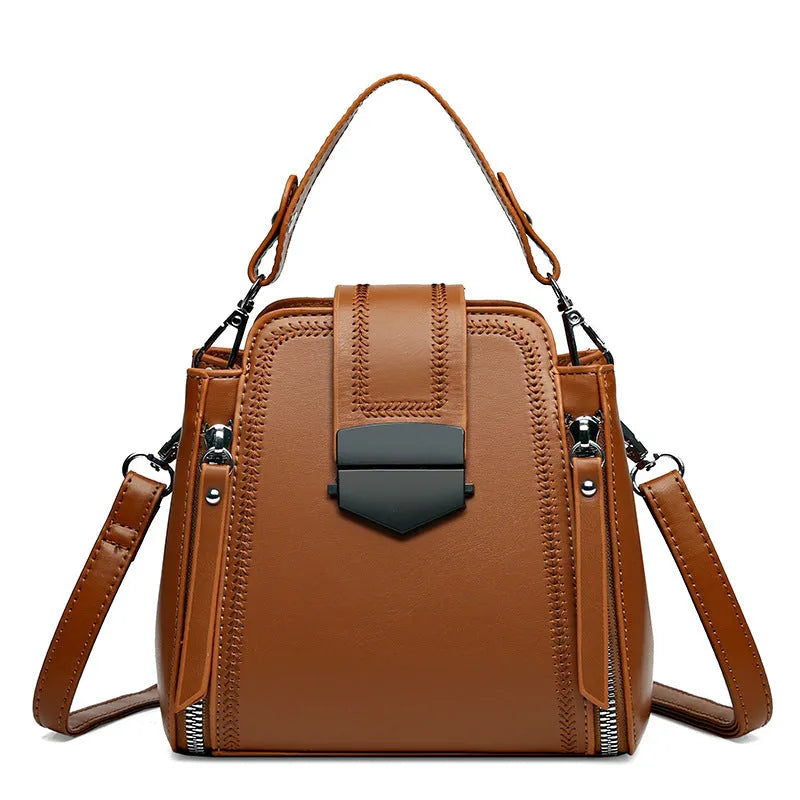 Square vertical PU leather handbag with textured finish and sewing thread detail in colour options