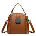Square vertical PU leather handbag with textured finish and sewing thread detail in colour options