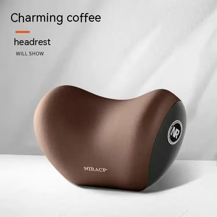 Black memory foam car lumbar support pillow and matching headrest pillow on a car seat.
