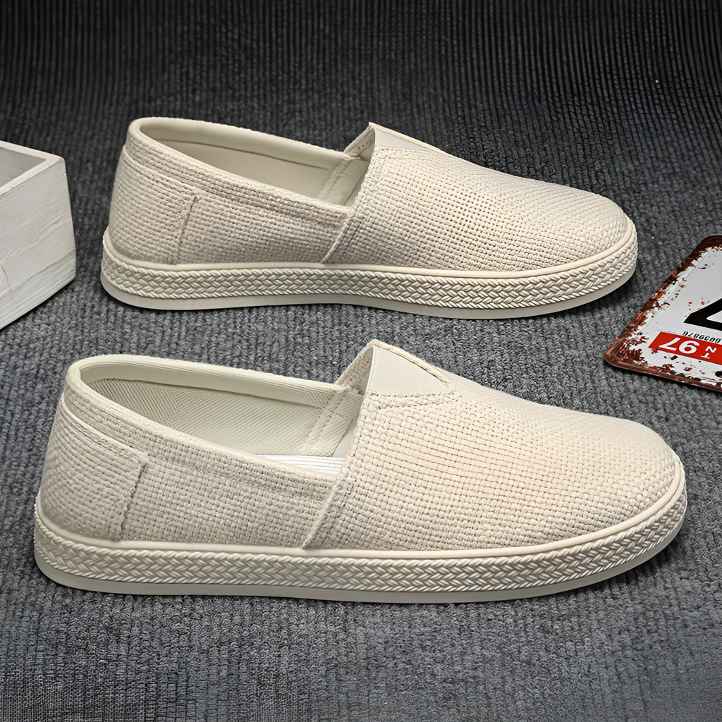 Men's beige linen cloth canvas shoes with round toe and visible stitching on PVC sole