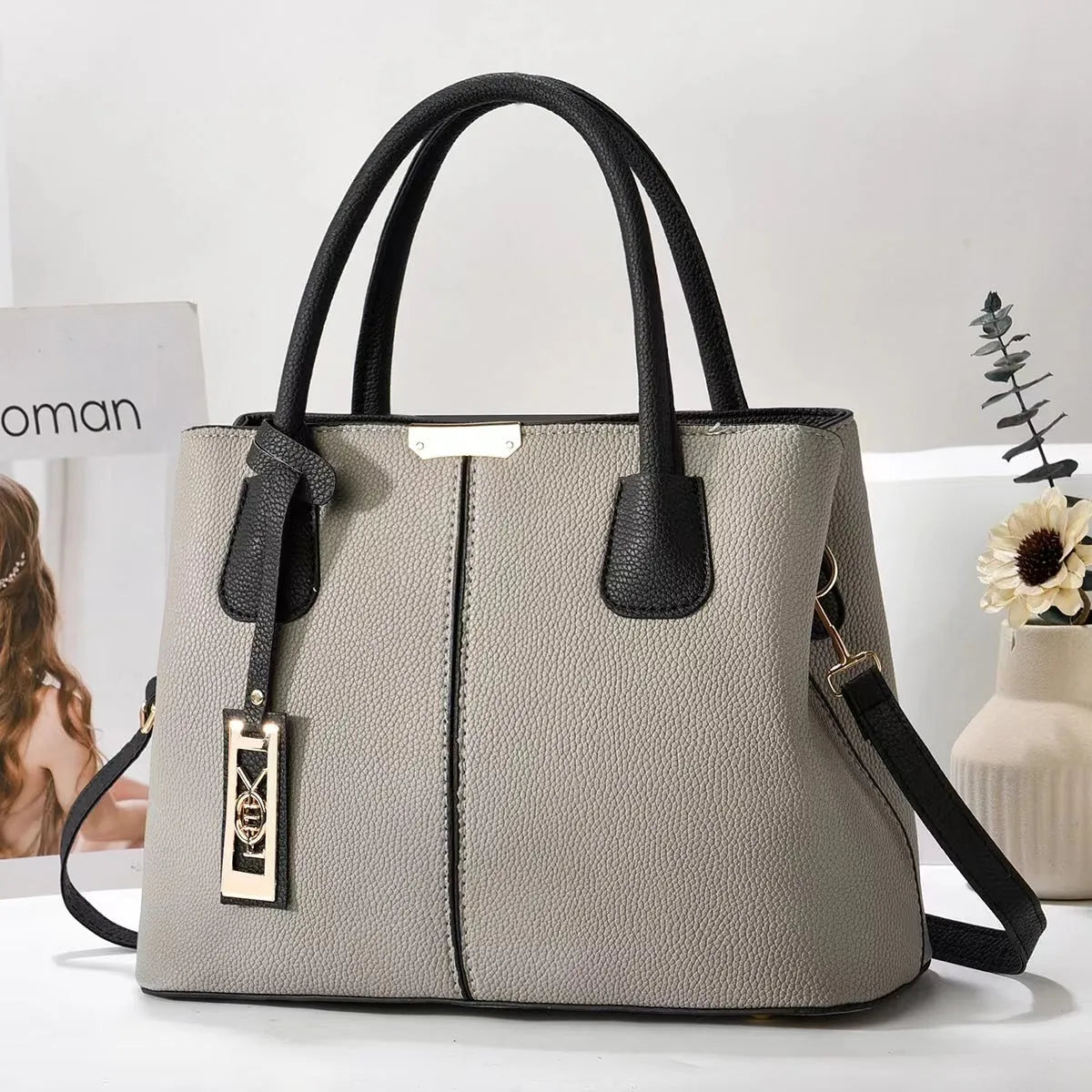 Women's large capacity shoulder bag in soft PU leather with adjustable strap and multiple colour options