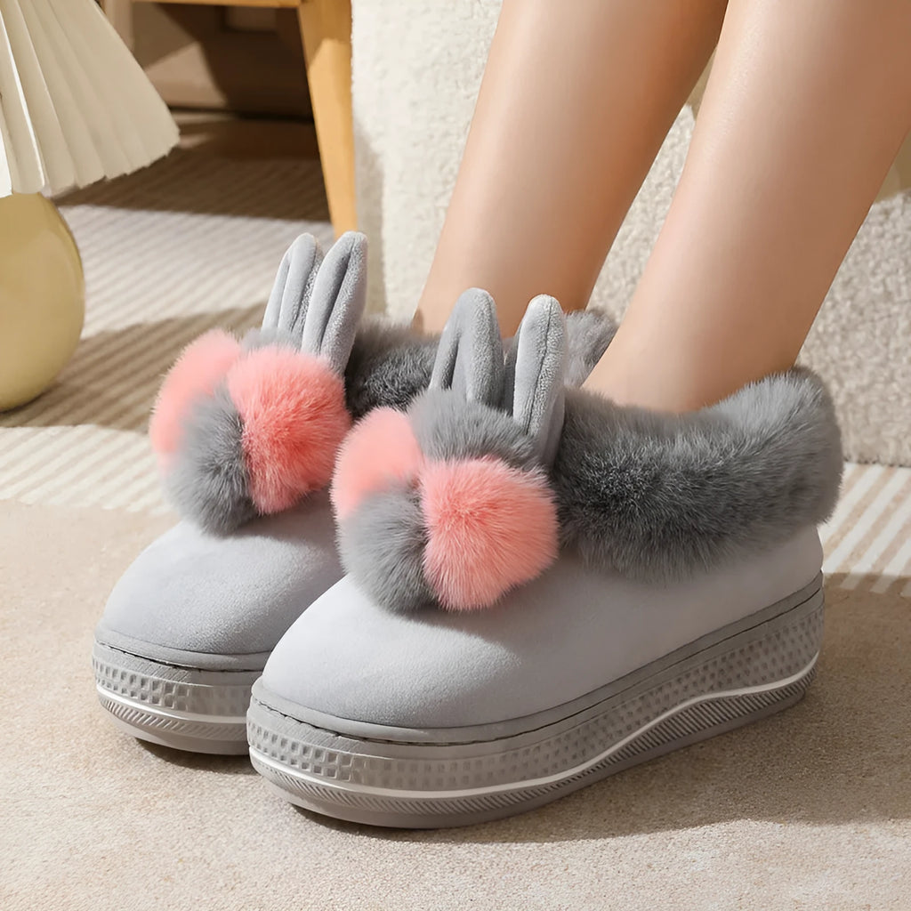 Black thick-soled high heel winter slipper with plush upper and textured TPR sole.