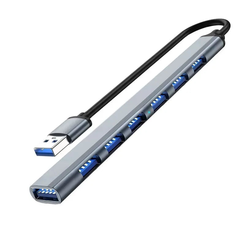 Blue USB-C 7-in-1 docking station with seven USB ports and 0.1m cable on a desk