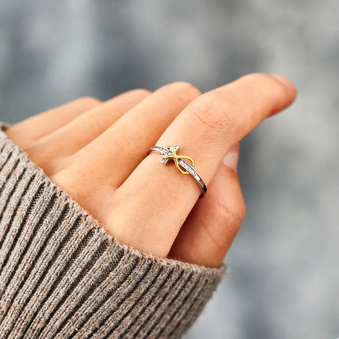 S925 sterling silver two-tone infinite cross ring with geometric line design and adjustable opening