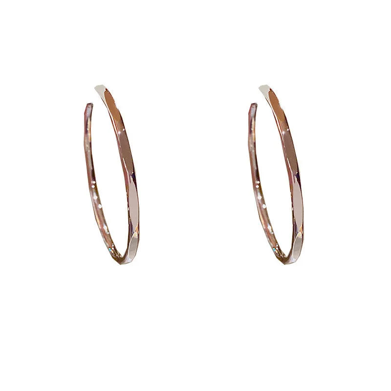 Silver needle exaggerated big hoop earrings in golden big circle with real gold plating on copper base