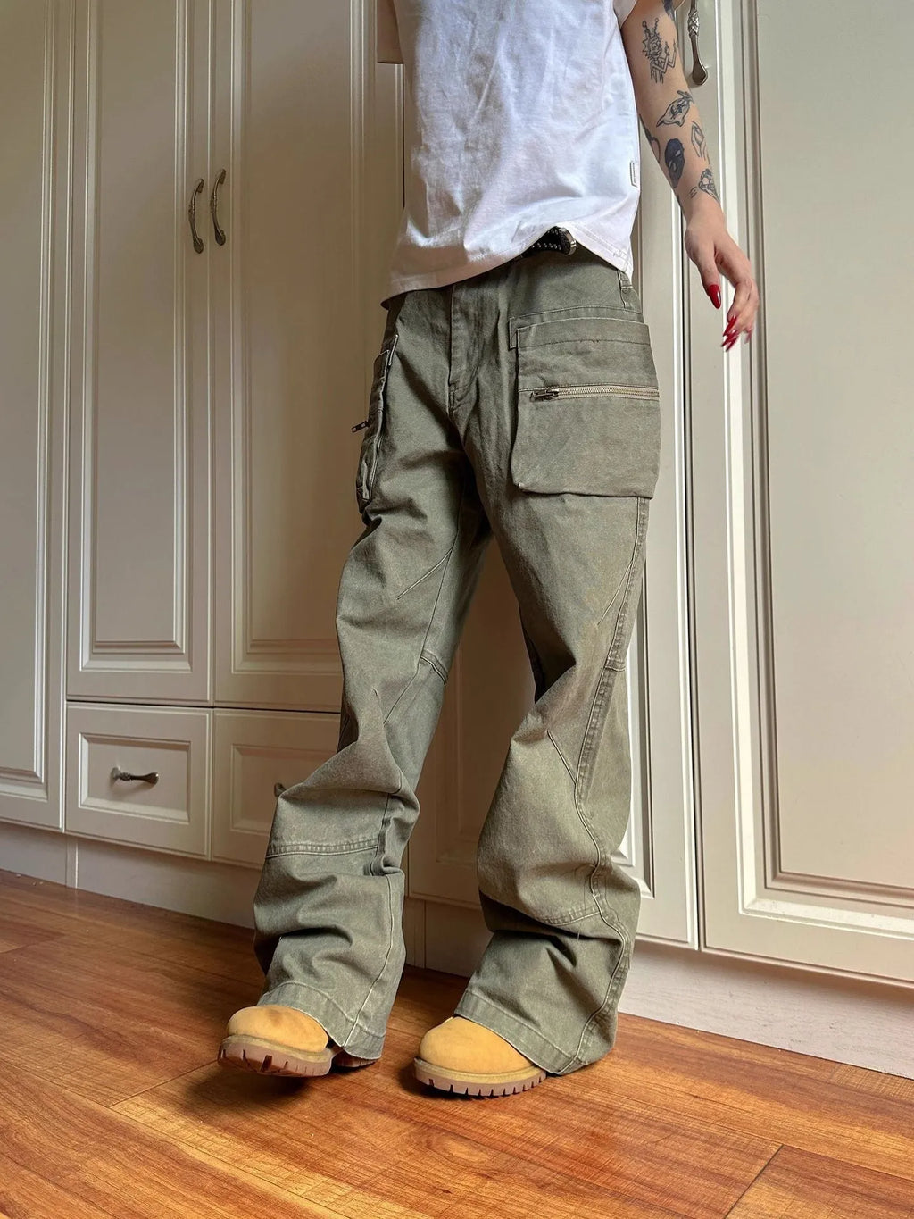Green casual trousers with double zipper workwear design and elastic waistband