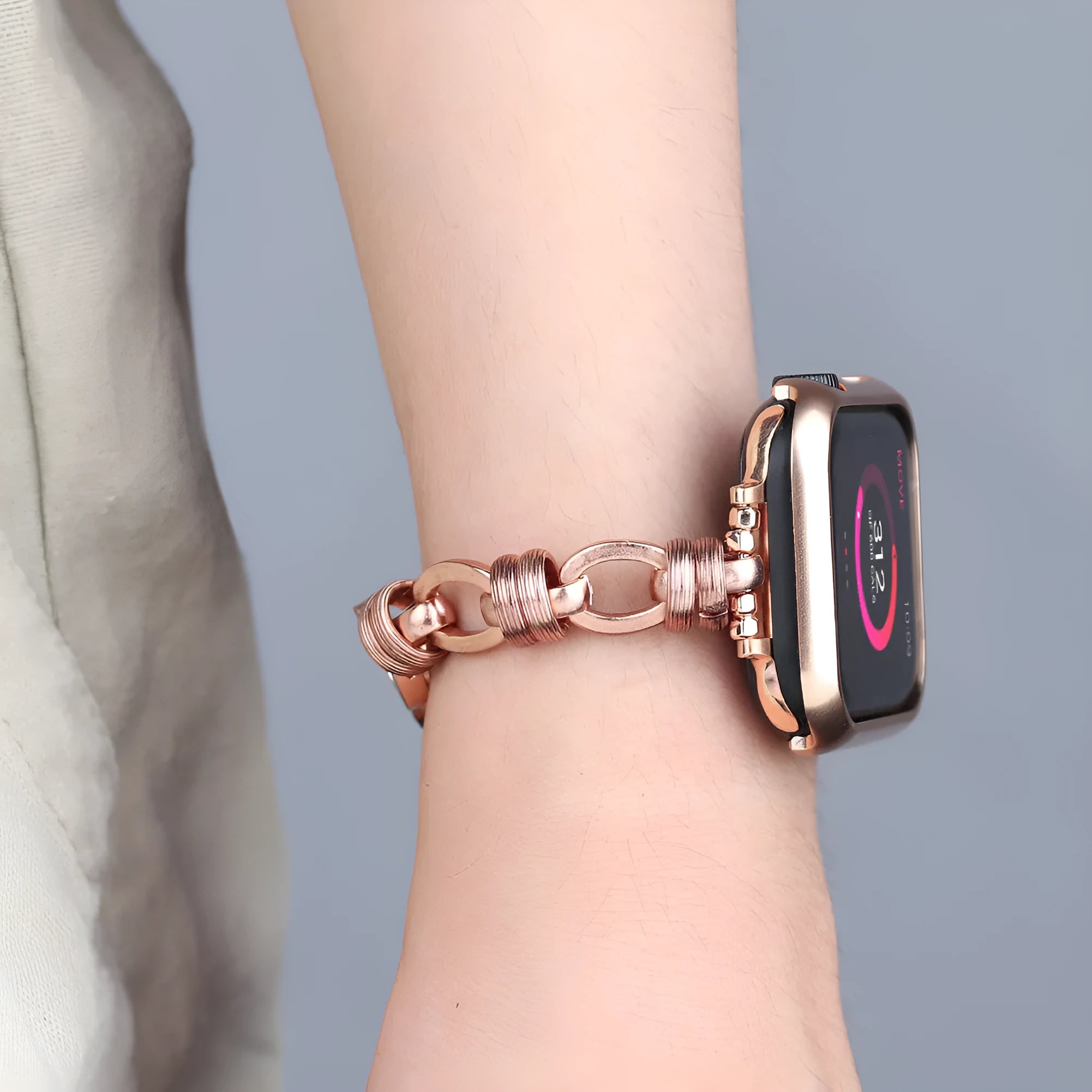 Stainless steel punk chain watch band for Apple Watch in silver finish on a wrist, showing chain links and custom connector
