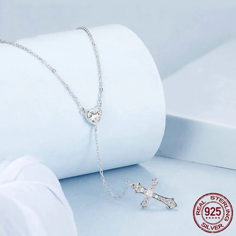 Silver love cross necklace for women with V-neck design and O-ring chain in colour BSN384