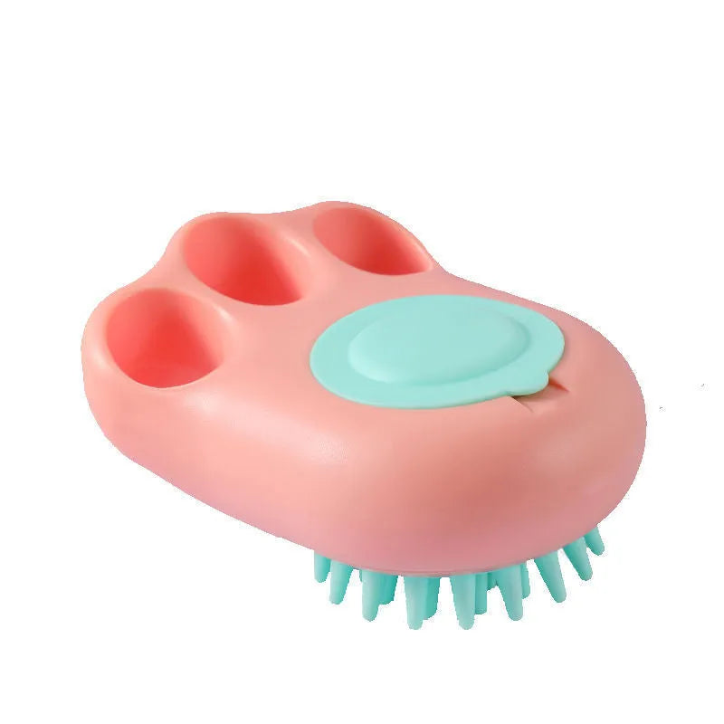 Blue pet bath and massage brush with silicone bristles and an ergonomic non-slip handle.