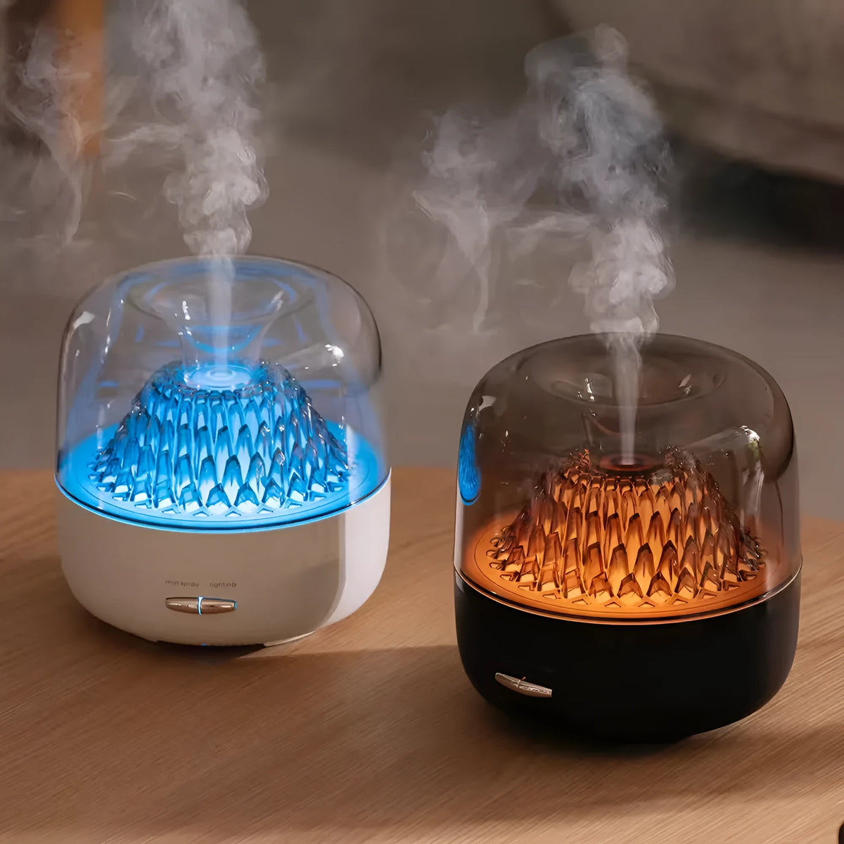 Round beige resin aroma diffuser with one fog outlet and colourful light on a desktop