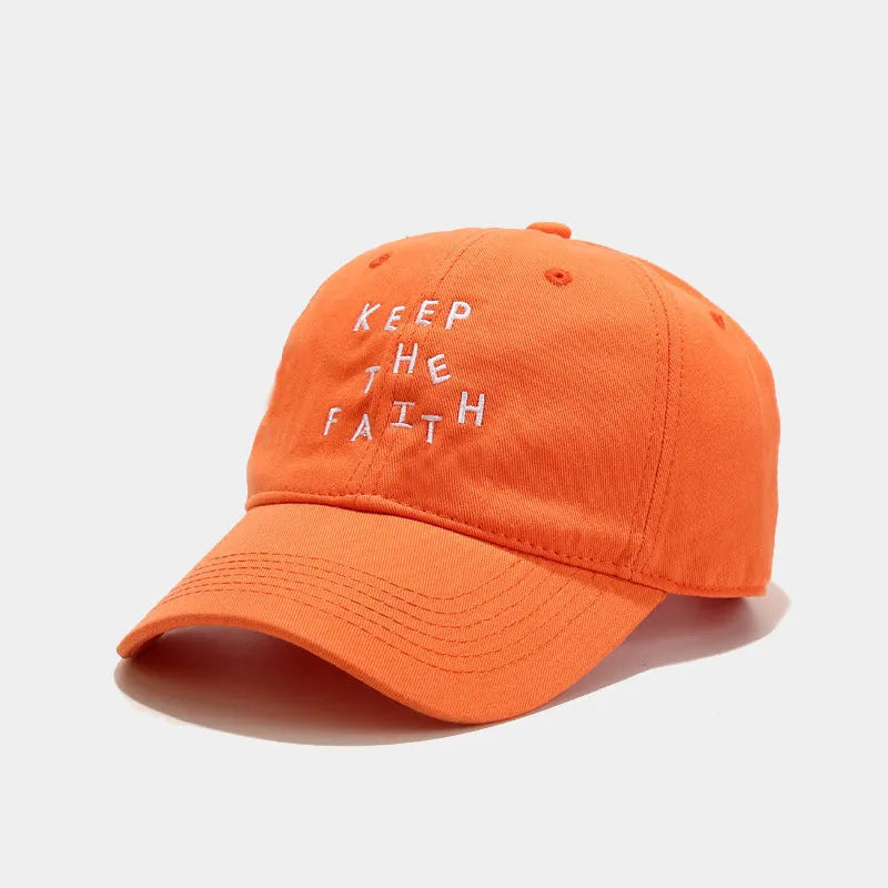Men's beige cotton baseball cap with adjustable strap and dome crown on a white background.