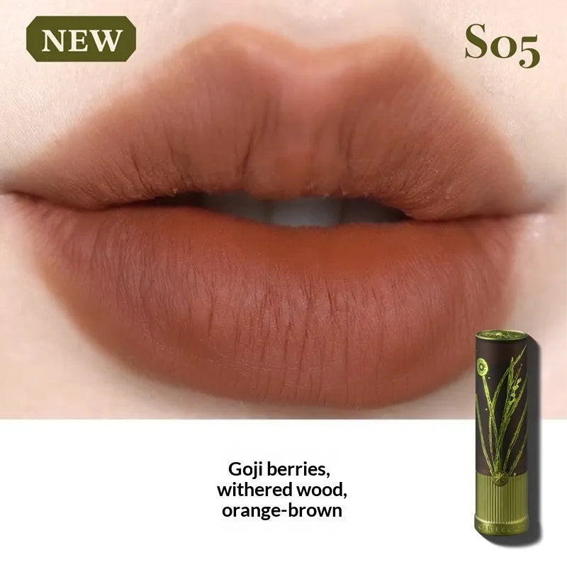 Matte brown lip mud in tube with applicator wand, low-saturation nude earth tone colour