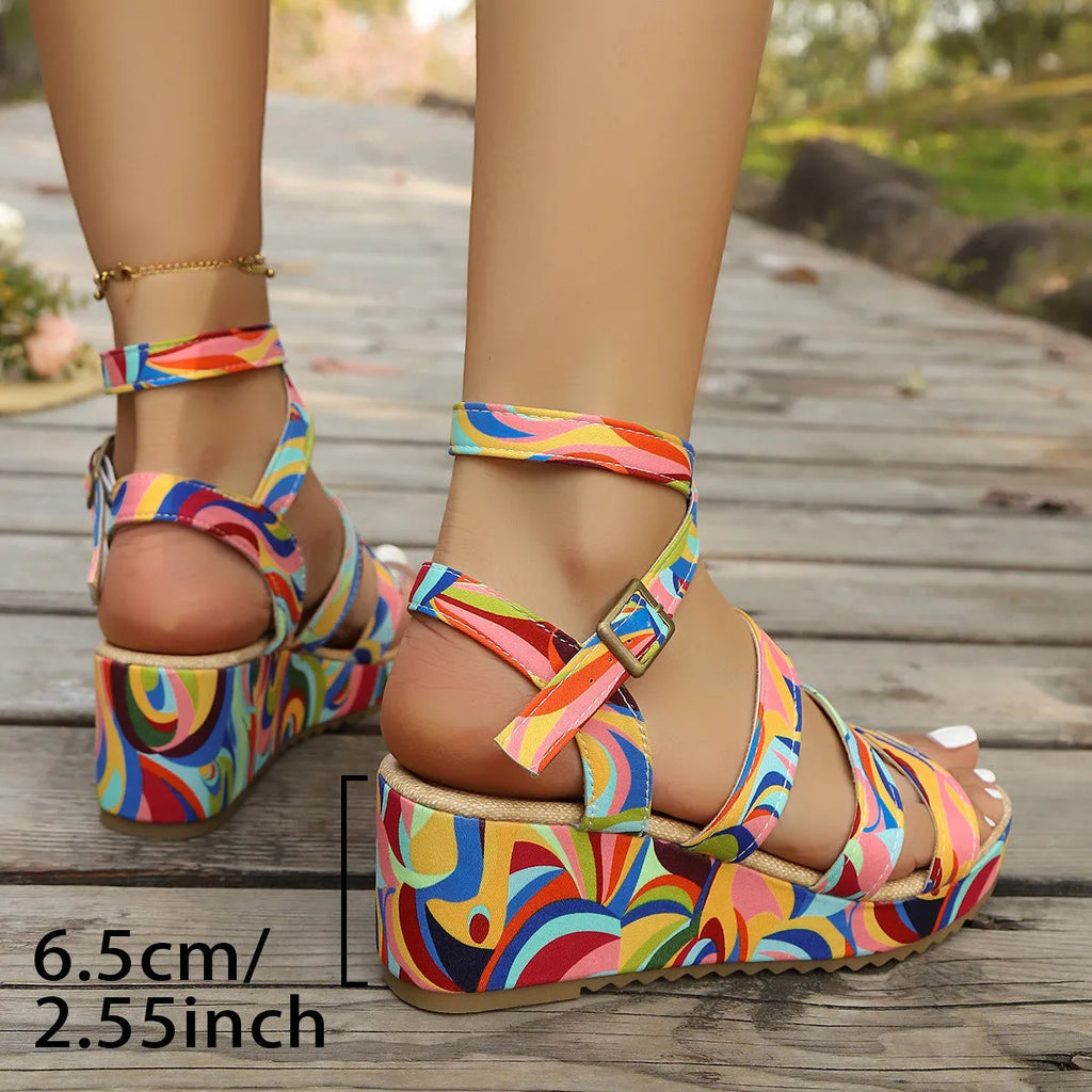 Women's buckle wedge sandals in lightweight PU material with a rubber sole and adjustable strap.