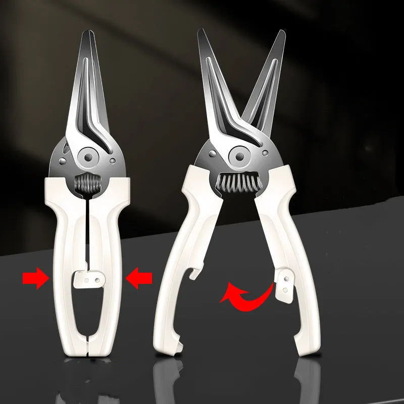 Creative magnetic suction kitchen scissors in stainless steel on a fridge door