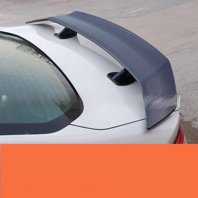 Punch-free ABS plastic car tail wing spoiler shown in bright black finish