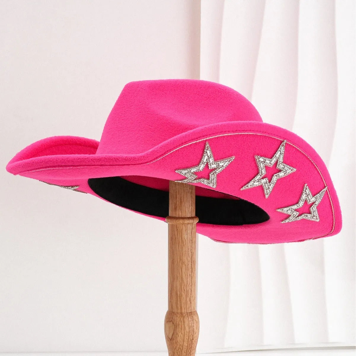 Beige polyester Western-style top hat with a conical crown and a silver hexagonal star decoration on the front.