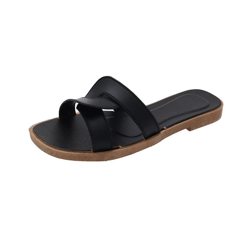 Women's PVC cross strap flip flop sandals in light blue on a white background.