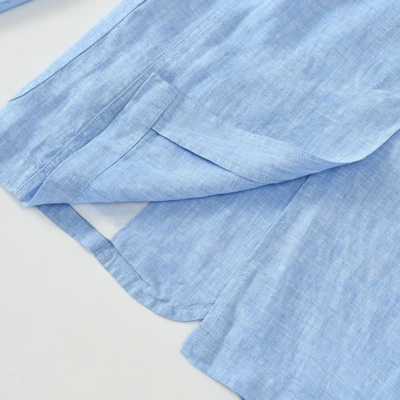 Men's solid colour linen suit coat with a stick pocket on a hanger.
