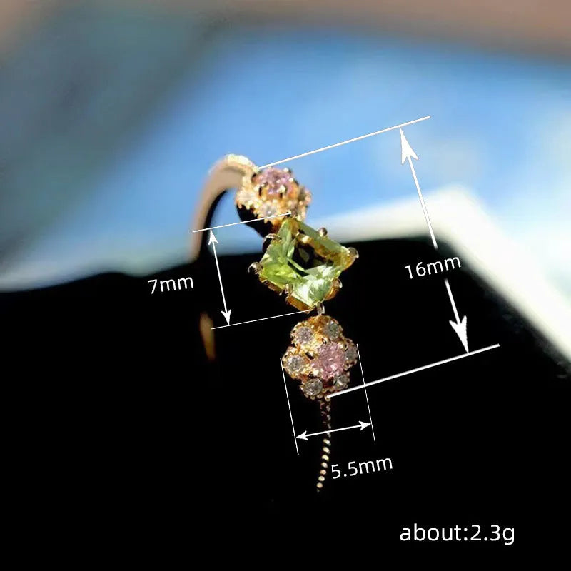 Women's copper ring with geometric flower design in Q740 gold colour, shown on a hand, available in sizes No 6 to No 10