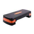 Grey Fit Step aerobic platform on a wood floor, showing its 68cm length and 15cm height.