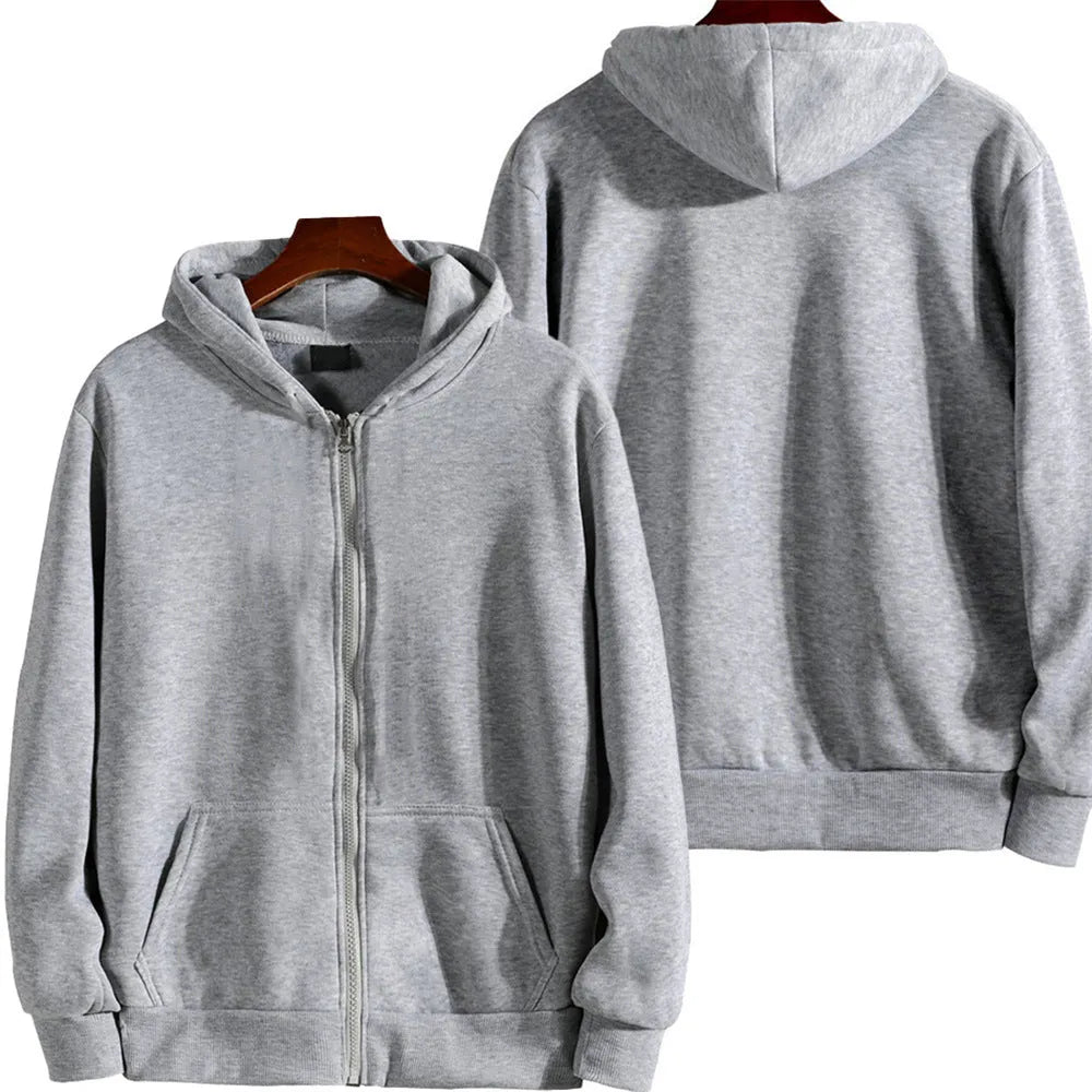 A man's loose fit solid colour zip-up sports jacket in a cardigan style.