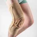 Adult basketball knee pads in nylon and spandex, sizes S M L XL, black and blue or grey and blue.