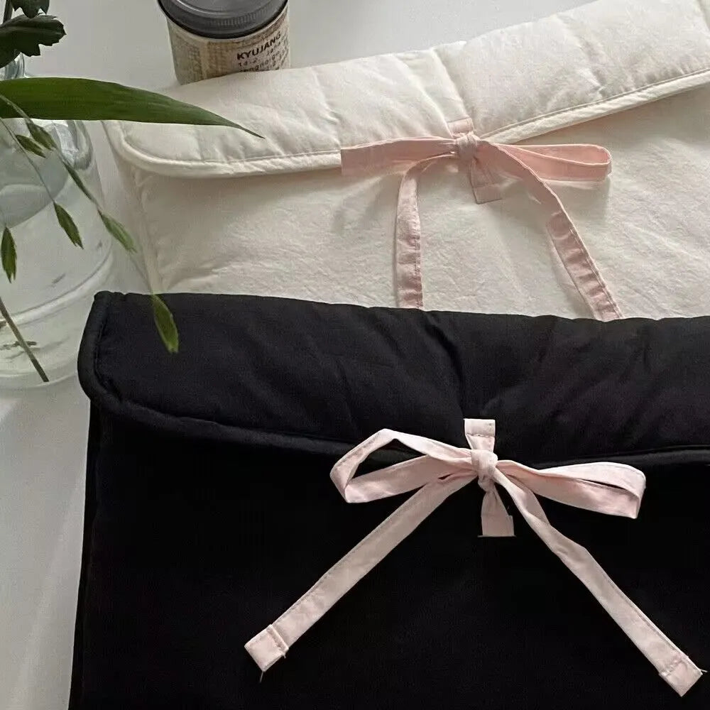 Women's ballet style bow quilted computer bag in black nylon with striped lining, fits 11-14 inch laptops