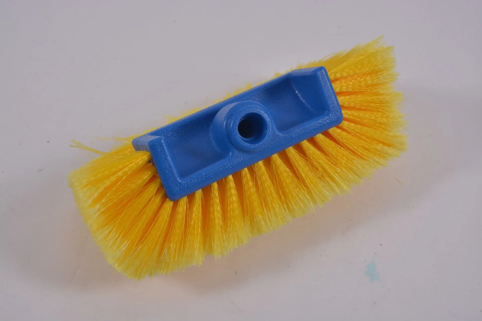 Portable car wash brush with telescopic rod and removable flow-through brush head in multiple colour options