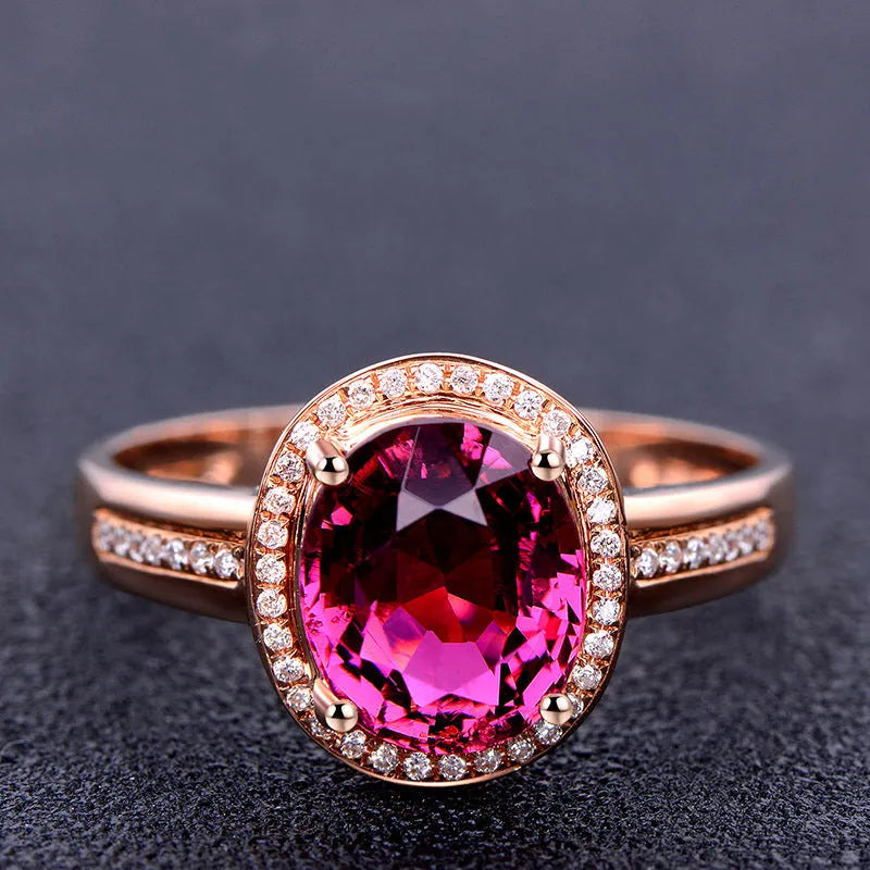 Geometric copper ring with gold-plated inlaid red crystal stones on rose gold adjustable band