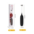 Black and white electric hand-held milk frother and blender for coffee beverages