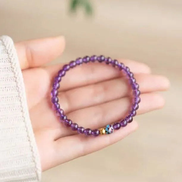 Nine purple lotus charm bracelet with mixed material construction and retro style design for women's jewellery